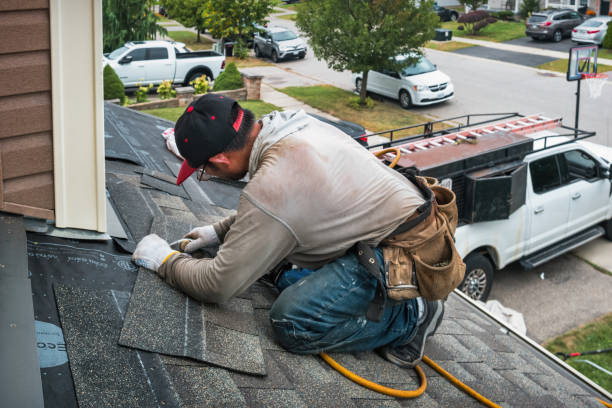 Professional Roofing technician working in Barrington, RI